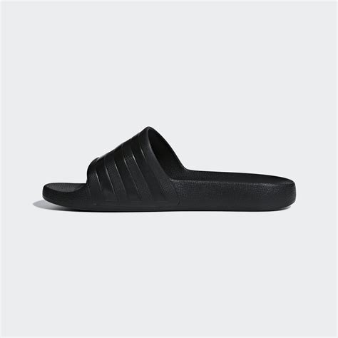 black adilette aqua slides